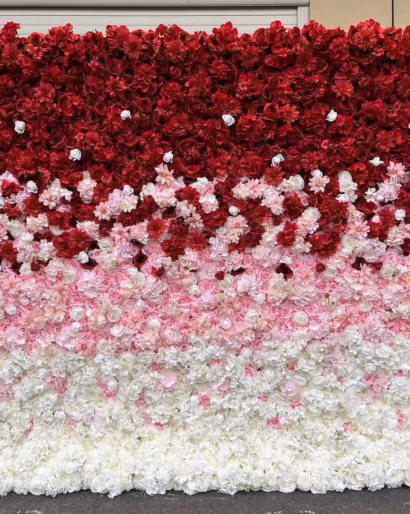 Red, pink, and white flower wall backdrop from RMJ Entertainment