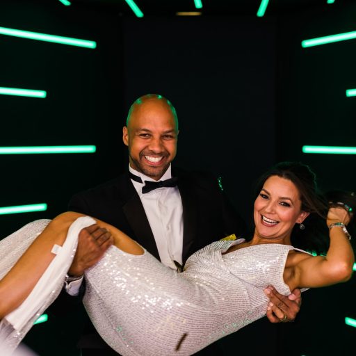 A lovely couple enjoying themselves posing for photos